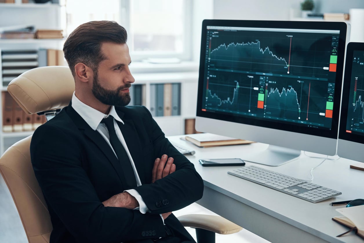 Person reviewing figures on a screen